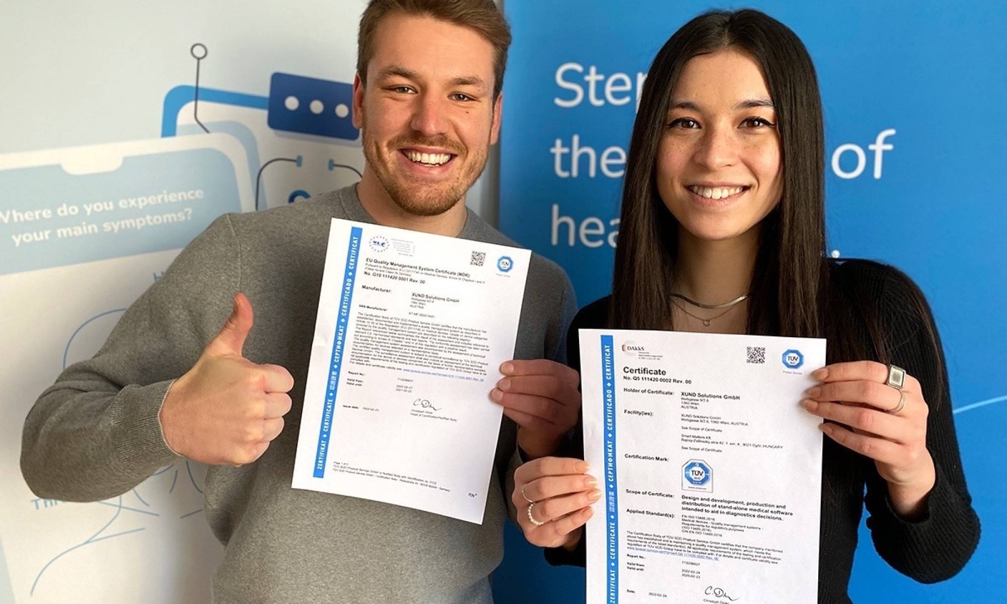 Christoph and Sophie holding the MDR certificate Christoph and Sophie holding the MDR certificate